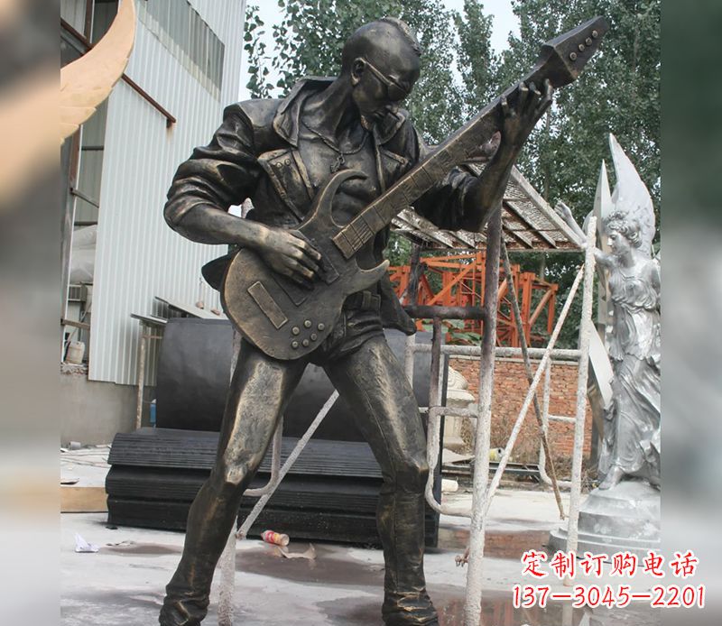 宁德男人弹吉他人物景观铜雕