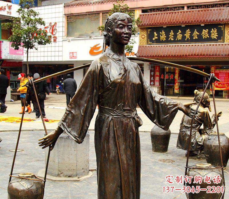 宁德挑着罐子的古代女人铜雕