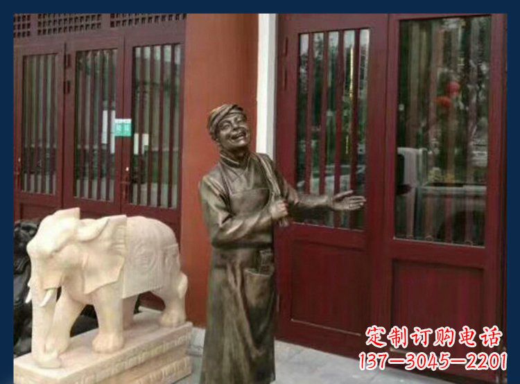 宁德铜雕店小二酒店迎宾人物雕塑